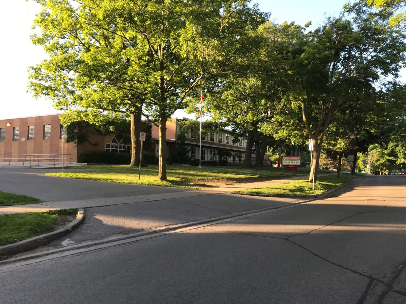 Exterior front entrance of John T. Tuck Public School in the Roseland neighborhood of Burlington, Ontario.