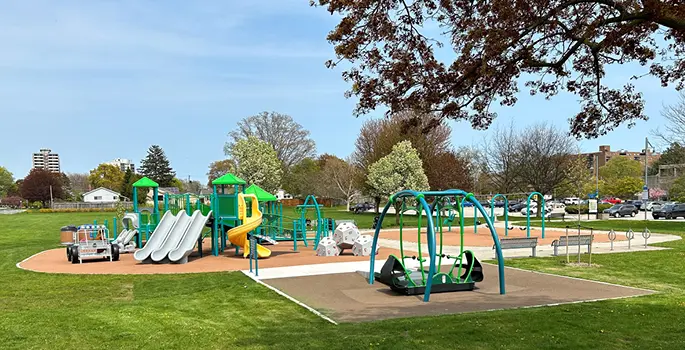 Central Park Burlington, Shoreacres' everyday backyard, with a library, tennis club, lawn bowling, community garden, and a historic bandshell.